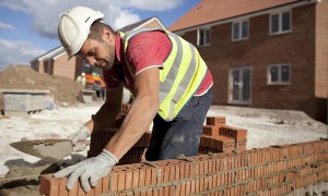 Safe bet: a builder at a Persimmon construction site for residential housing.